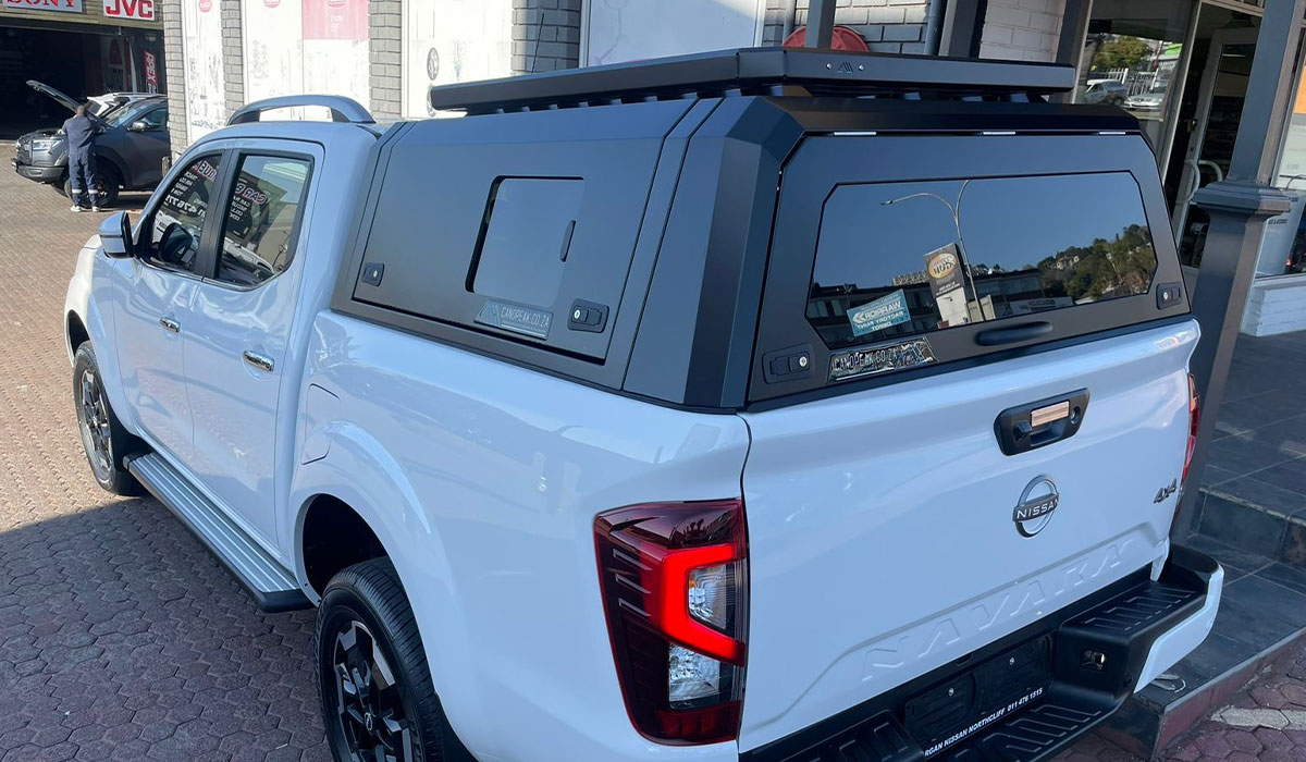 Canopeak canopy with a roof rack on a Nissan Navara